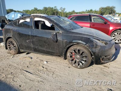 Czwarte zdjęcie samochodu z boku: 2023 TESLA MODEL Y VIN:7SAYGDEF8PF835958 - miniatura