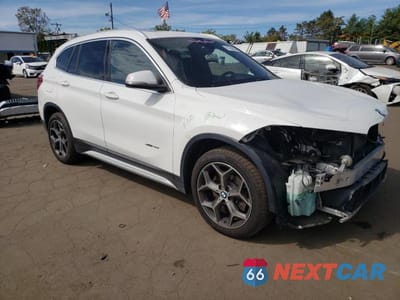 Czwarte zdjęcie samochodu z boku: 2017 BMW X1 XDRIVE28I VIN:WBXHT3C32H5F69907 - miniatura