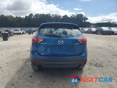 Zdjęcie 6 z 15 samochodu: 2014 MAZDA CX-5 SPORT VIN:JM3KE2BE9E0302206 - miniatura