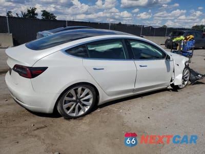 Trzecie zdjęcie samochodu z tyłu: 2020 TESLA MODEL 3 VIN:5YJ3E1EA1LF797564 - miniatura