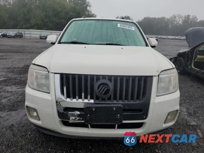 Piąte zdjęcie samochodu w środku: 2010 MERCURY MARINER PREMIER VIN:4M2CN9HG1AKJ28171 - miniatura