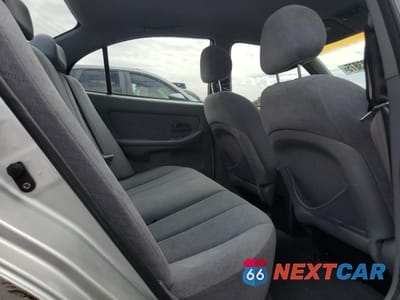 Zdjęcie 10 z 12 samochodu: 2004 HYUNDAI ELANTRA GLS VIN:KMHDN46D64U819609 - miniatura