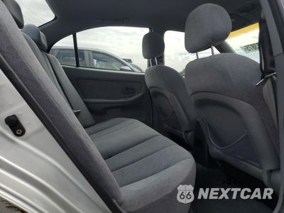 Zdjęcie 10 z 12 samochodu: 2004 HYUNDAI ELANTRA GLS VIN:KMHDN46D64U819609 - miniatura