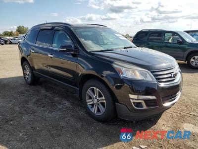 Czwarte zdjęcie samochodu z boku: 2016 CHEVROLET TRAVERSE LT VIN:1GNKRGKD4GJ259898 - miniatura