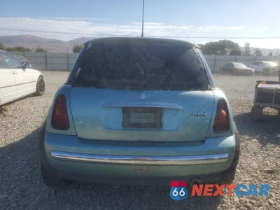 Zdjęcie 6 z 12 samochodu: 2002 MINI COOPER VIN:WMWRC33442TE12938 - miniatura