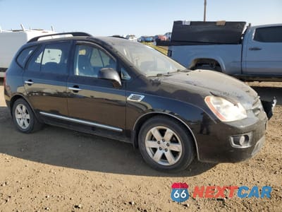 Czwarte zdjęcie samochodu z boku: 2009 KIA RONDO LX VIN:KNAFG526797258344 - miniatura