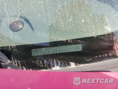 Zdjęcie 12 z 14 samochodu: 2002 TOYOTA COROLLA CE VIN:1NXBR12E62Z609307 - miniatura
