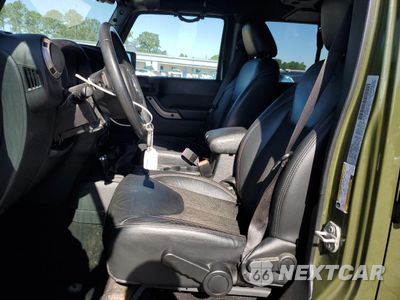 Zdjęcie 7 z 15 samochodu: 2016 JEEP WRANGLER UNLIMITED SAHARA VIN:1C4BJWEG6GL241486 - miniatura