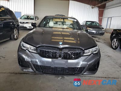 Piąte zdjęcie samochodu w środku: 2021 BMW M340XI VIN:3MW5U9J03M8B63781 - miniatura