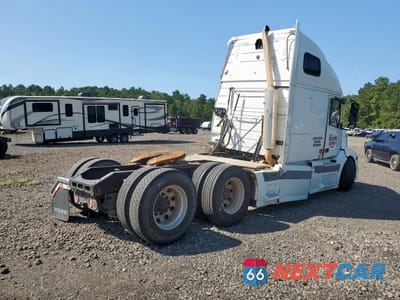 Czwarte zdjęcie samochodu z boku: 2006 VOLVO VN VNL VIN:4V4NC9GH96N398029 - miniatura