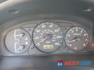 Zdjęcie 9 z 12 samochodu: 2003 MAZDA PROTEGE DX VIN:JM1BJ225X30137123 - miniatura