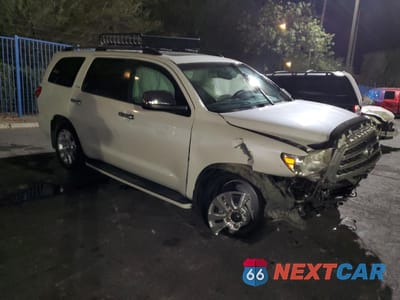 Czwarte zdjęcie samochodu z boku: 2016 TOYOTA SEQUOIA PLATINUM VIN:5TDDW5G13GS145679 - miniatura