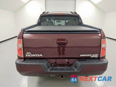 Zdjęcie 6 z 14 samochodu: 2011 HONDA RIDGELINE RTS VIN:5FPYK1F47BB006354 - miniatura