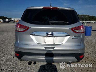 Zdjęcie 6 z 13 samochodu: 2014 FORD ESCAPE TITANIUM VIN:1FMCU0J90EUC22614 - miniatura