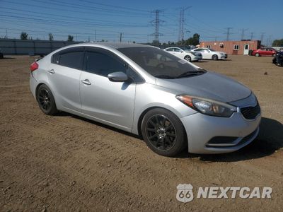 Czwarte zdjęcie samochodu z boku: 2014 KIA FORTE LX VIN:KNAFK4A62E5162220 - miniatura