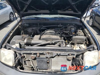 Zdjęcie 11 z 12 samochodu: 2000 TOYOTA TUNDRA SR5 VIN:5TBRT3413YS009019 - miniatura