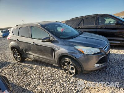 Czwarte zdjęcie samochodu z boku: 2014 FORD ESCAPE TITANIUM VIN:1FMCU0J99EUA63883 - miniatura