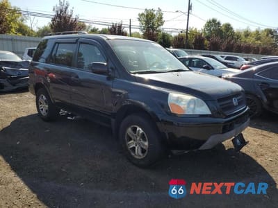 Czwarte zdjęcie samochodu z boku: 2005 HONDA PILOT EX VIN:2HKYF18415H571215 - miniatura