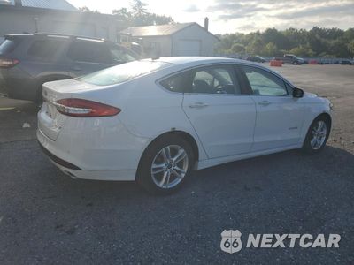 Trzecie zdjęcie samochodu z tyłu: 2018 FORD FUSION SE HYBRID VIN:3FA6P0LU7JR287011 - miniatura