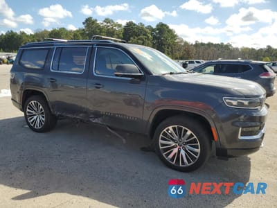 Czwarte zdjęcie samochodu z boku: 2022 JEEP GRAND WAGONEER SERIES III VIN:1C4SJVGJ6NS195647 - miniatura