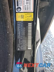 Zdjęcie 12 z 14 samochodu: 2006 BMW 750 I VIN:WBAHL83506DT07215 - miniatura