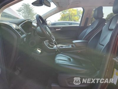 Zdjęcie 7 z 14 samochodu: 2021 FORD EDGE TITANIUM VIN:2FMPK4K96MBA27134 - miniatura