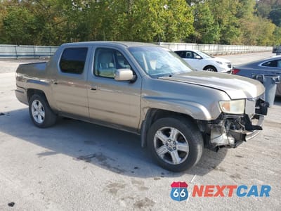 Czwarte zdjęcie samochodu z boku: 2011 HONDA RIDGELINE RTL VIN:5FPYK1F55BB454052 - miniatura