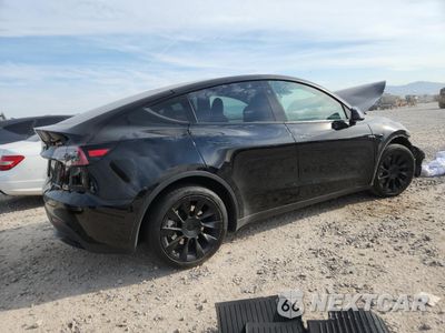 Trzecie zdjęcie samochodu z tyłu: 2023 TESLA MODEL Y VIN:7SAYGDEE9PF828055 - miniatura