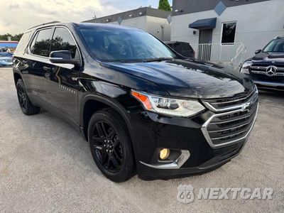 Czwarte zdjęcie samochodu z boku: 2021 CHEVROLET TRAVERSE LT VIN:1GNERGKW7MJ168621 - miniatura