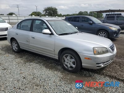 Czwarte zdjęcie samochodu z boku: 2004 HYUNDAI ELANTRA GLS VIN:KMHDN46D64U819609 - miniatura