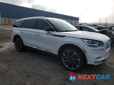 Czwarte zdjęcie samochodu z boku: 2023 LINCOLN AVIATOR RESERVE VIN:5LM5J7XC3PGL15123 - miniatura