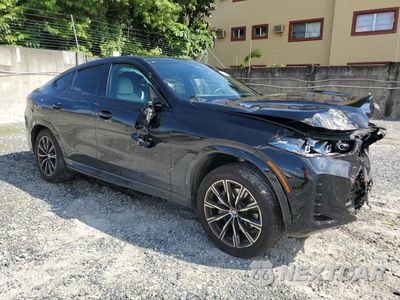Czwarte zdjęcie samochodu z boku: 2025 BMW X6 XDRIVE40I VIN:5UX33EX0XS9Z03745 - miniatura