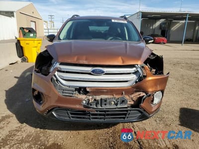 Piąte zdjęcie samochodu w środku: 2017 FORD ESCAPE TITANIUM VIN:1FMCU0JD0HUA60072 - miniatura