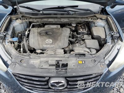 Zdjęcie 12 z 13 samochodu: 2016 MAZDA CX-5 SPORT VIN:JM3KE4BY3G0630102 - miniatura