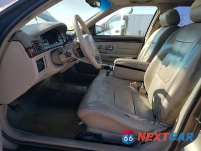 Zdjęcie 7 z 14 samochodu: 1999 CADILLAC DEVILLE VIN:1G6KD54YXXU777513 - miniatura