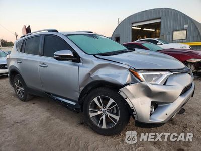 Czwarte zdjęcie samochodu z boku: 2017 TOYOTA RAV4 XLE VIN:2T3RFREV4HW545009 - miniatura