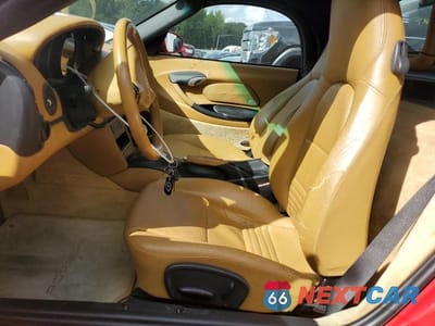 Zdjęcie 7 z 13 samochodu: 2004 PORSCHE BOXSTER VIN:WP0CA29894S620225 - miniatura