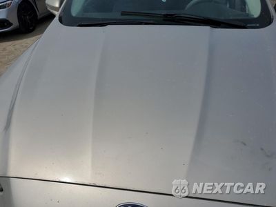 Zdjęcie 11 z 12 samochodu: 2015 FORD FUSION SE HYBRID VIN:3FA6P0LU2FR226172 - miniatura