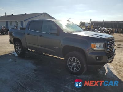 Czwarte zdjęcie samochodu z boku: 2015 GMC CANYON SLE VIN:1GTG6BE36F1273197 - miniatura