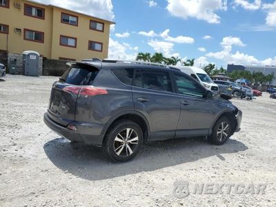 Trzecie zdjęcie samochodu z tyłu: 2017 TOYOTA RAV4 XLE VIN:2T3WFREV9HW386152 - miniatura