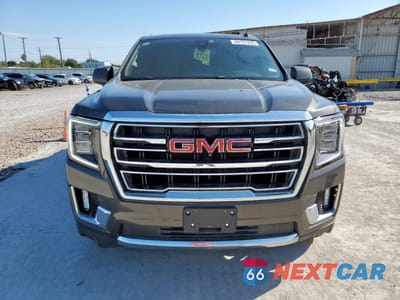 Piąte zdjęcie samochodu w środku: 2021 GMC YUKON SLT VIN:1GKS1BKD6MR441493 - miniatura