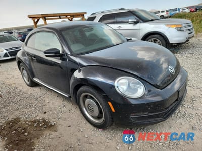 Czwarte zdjęcie samochodu z boku: 2016 VOLKSWAGEN BEETLE 1.8T VIN:3VWF17AT6GM638864 - miniatura