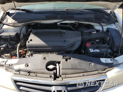 Zdjęcie 12 z 15 samochodu: 2002 HONDA ODYSSEY EX VIN:2HKRL18672H536236 - miniatura