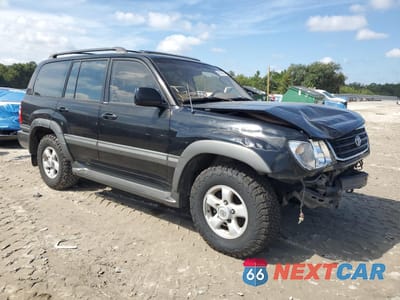 Czwarte zdjęcie samochodu z boku: 2000 TOYOTA LAND CRUISER VIN:JT3HT05J2Y0124735 - miniatura