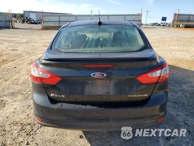 Zdjęcie 6 z 12 samochodu: 2014 FORD FOCUS TITANIUM VIN:1FADP3J2XEL316175 - miniatura