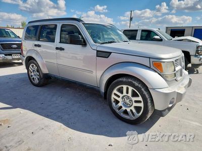 Czwarte zdjęcie samochodu z boku: 2011 DODGE NITRO HEAT VIN:1D4PT4GK7BW589880 - miniatura