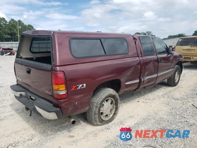 Trzecie zdjęcie samochodu z tyłu: 2002 GMC NEW SIERRA K1500 VIN:2GTEK19T121425883 - miniatura