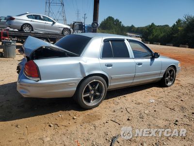 Trzecie zdjęcie samochodu z tyłu: 2003 FORD CROWN VICTORIA LX VIN:2FAFP74W83X210242 - miniatura