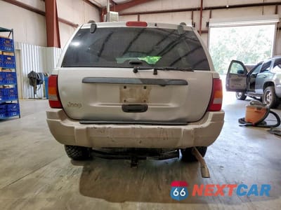 Zdjęcie 6 z 13 samochodu: 2004 JEEP GRAND CHEROKEE LAREDO VIN:1J4GX48S34C242206 - miniatura