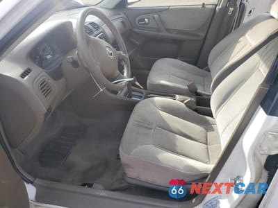 Zdjęcie 7 z 14 samochodu: 2000 MAZDA PROTEGE DX VIN:JM1BJ222XY0308482 - miniatura